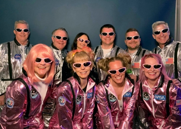 group photo at a fun costume event